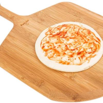 China Wooden Trays and Dishes Wholesale Multifunctional New Design Wooden Pizza Skin Bamboo Cutting Board for sale