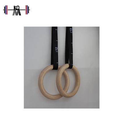 China Durable Nylon Cross Strap Fitness Wooden Training Gymnastic Rings for sale