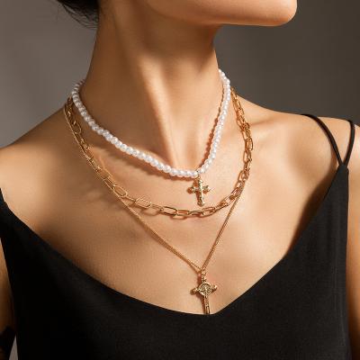 China 2021 Trendy Trendy Tarnish Free Bead Multi Layer Jesus Cross Necklace For Women for sale