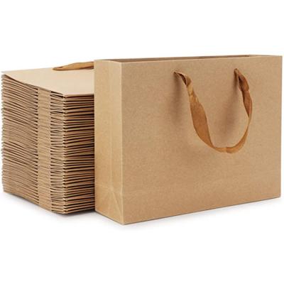 China Eco Friendly Recyclable Custom Color Printed Brown Handled Clothes Candy Gift Wrapping Paper Bag With Handles for sale