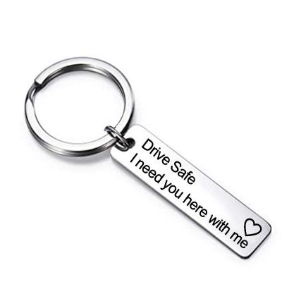 China Custom Home Decoration Stainless Steel DIY Key Chain With Designs And Titanium Steel Chinese And English Steel Chinese Letter Sample Metal Key Chain for sale