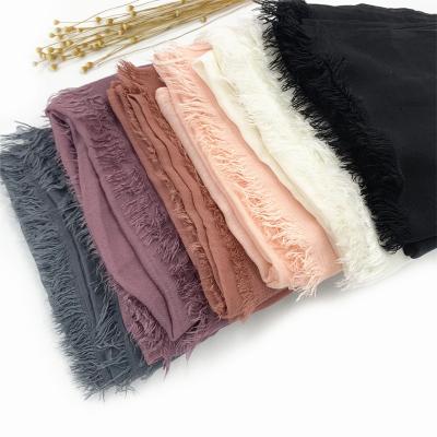 China Popular Hot Selling New Cotton Scarf Malaysia Muffler Style Tassels Women Soft Simple Simple Solid Elegant Scarves Shawls for sale