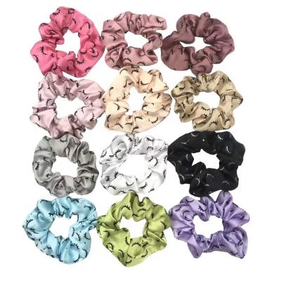 China Women Hair Tying and Decorating Wholesale Girls Shape Elastic Hair Bands Shine Satin Scrunchies Eyelash Print Hair Scrunchies for sale