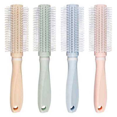 China OEM Wholesale Waterproof Candy Color Pink Cushion Hair Dryer Sweep Rotating Hair Brush Combs for sale