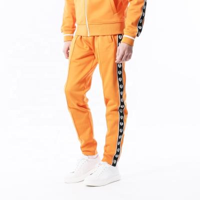 China Anti-Static Custom Mens Track Pants Sweatpants Jogging Orange Slacks Trousers For Man Joggers Trousers for sale