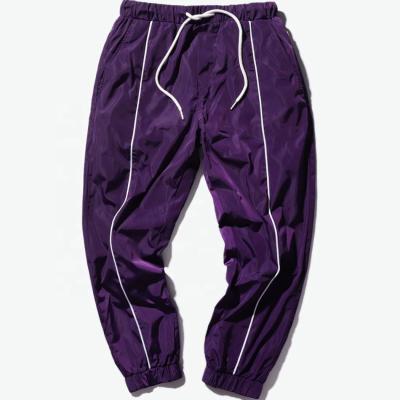 China Custom Made Breathable Mens Casual Sports Pants Side Strap Drawstring Elastic Canvas Purple Sweatpants for sale