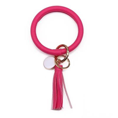 China PU Key Chain Women Bracelet Tassel Bracelet Single Metal Buckle Magnetic Pendant Fashion Trendy Buckle for sale