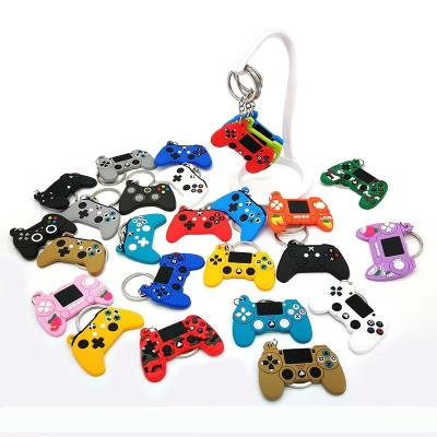 China Hot selling key chain game machine game self-defense jewelry bag lovely cartoon handle key chain creative PVC creative wholesale customization bag for sale