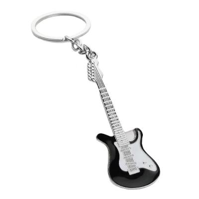 China Mini Guitar Cartoon Musical Instrument Novelty Gifts Charm Mini Creative Metal Guitar Key Chain Kawaii High Quality Cute Car for sale