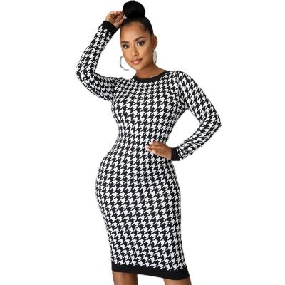 China Anti-wrinkle autumn 2021 new long-sleeved round neck back with hollow-out temperament printing slimming skirt women's dress for sale