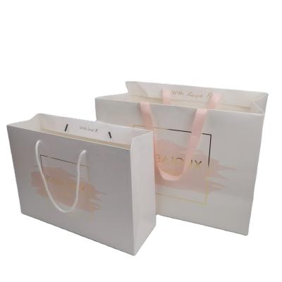 China Custom Recyclable Logo Printed Handle White Paper Bag Package Online Offset Printing For Wedding Gift Jewelry for sale