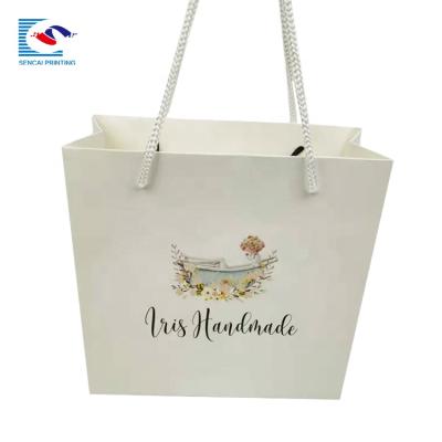 China Factory Price Wholesale Recyclable Logo Printed White Jewelry Paper Bag With Handle for sale