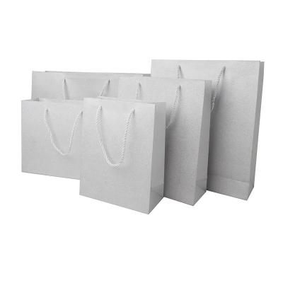 China OEM Recyclable High Quality Colorful Glitter Paper Craft Paper Card Shopping Bags with Ribbon Handle for Gift Clothing Shoes Packaging for sale