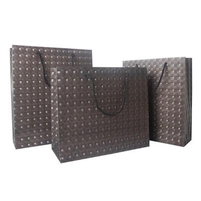 China Materials OEM High Quality Colorful Glitter Paper Craft Recycled Paper Card Shopping Bags with Ribbon Handle for Gift Clothing Shoes Packaging for sale