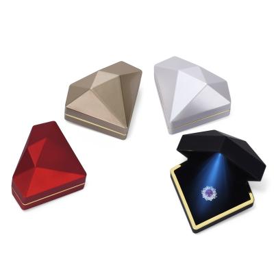 China Factory Custom Flip Jewelry Packaging Box Wholesale Recyclable Diamond Shaped Box With LED Light For Sapphire Necklace Ring Packaging for sale