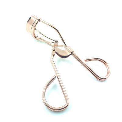 China Rose Gold Makeup Eyelash Curler Cosmetic Eyelash Clips Hot Selling Wire Iron Makeup Tool Accessories for sale