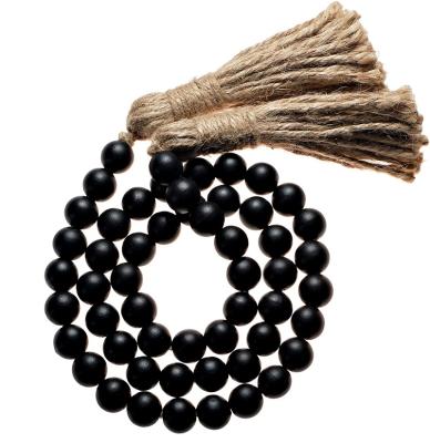 China wooden bead wooden garland with beaded tassel garland for decoration farmhouse beads for sale