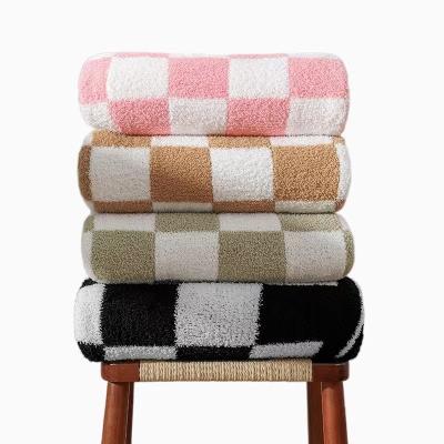 China Simple High Quality Checkerboard Pattern Microfiber Feather Super Soft Luxury Yarn Knit Throw Blanket For Adult Sleep for sale