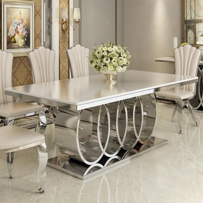 China New Design Elegant Luxury Marble Morden Dining Table Stainless Steel 6 Seater Office Dining Table for sale