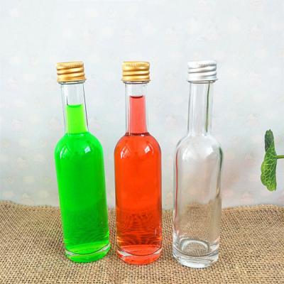 China Clear Round 50ml Stock Round Liquor Juice Wine Water Glass Beverage Bottle Eco-friendly Mini With Screw Lid for sale