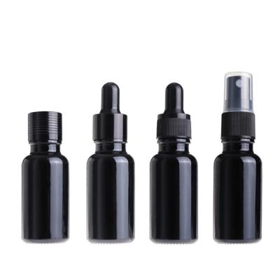 China Personal Care 5ml 10ml 15ml 20ml 30ml 50ml 100ml Essential Oil Black Glass Bottle With Dropper for sale