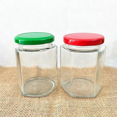 China Xuzhou Factory 60ml 80ml 100ml 180ml 280ml 380ml 500ml 730ml Hexagonal Food Storage Glass Jar With Lid for sale