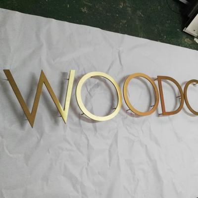 China Buildings House Number Logo Advertising Laser Cutting Solid Stainless Steel Letters Sign for sale