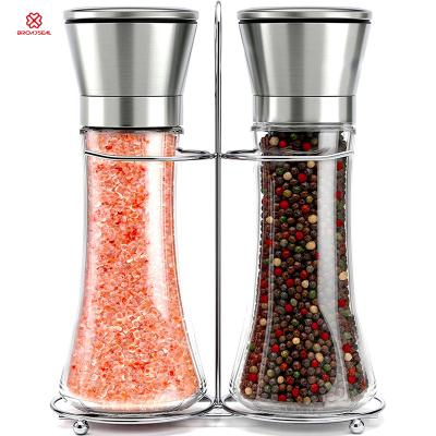 China Refillable Stainless Steel Salt and Pepper Shaker Adjustable Coarseness Pepper Mills Sea Salt and Pepper Grinder Set with Stand for sale