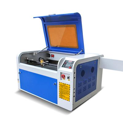 China 50w 60w 80w 100w CO2 4060 Air Cooled Laser Engraving Machine for sale