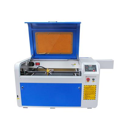 China Interactive system 4060 small laser craver glass craving cnc laser acrylic engraving cutting machine for sale