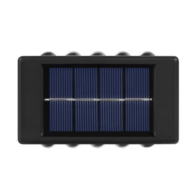 China Easy to Install and Cheap Black ODM OEM Shell Button Solar Outdoor Up and Down Bright Atmosphere Wall Light for sale