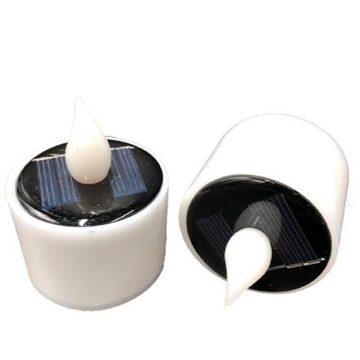 China Garde Christmas Atmosphere Candle Light Garden Decoration Solar Induction Garden Light for sale