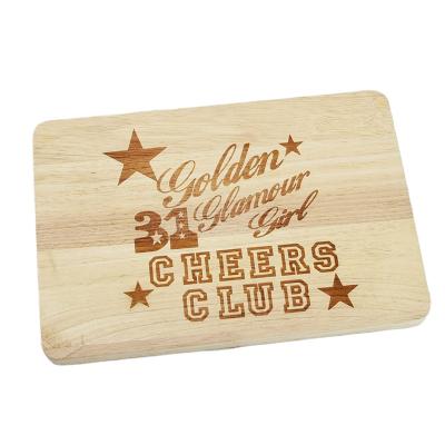 China Sustainable Chopper Handcrafted Premium Wooden Cutting Board With Laser Engraving Design for sale