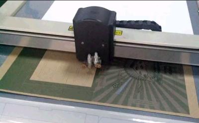 China Printed cardboard paper box registration cutting table for sale