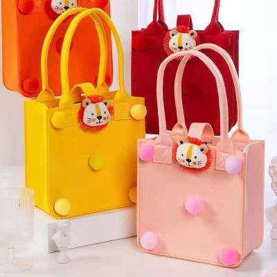 China Cheap Kids Felt Cute and Durable Going Out Bag Handbag Set Fashion Portable Felt Handbag for sale