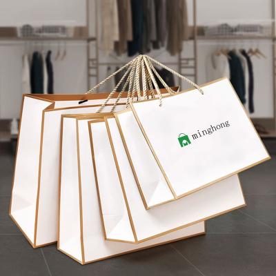 China High Quality Promotional Wholesale Luxury Apparel Materials Shoes Recycled Gift Shopping Paper Bag Recycled Packaging Custom Logo for sale