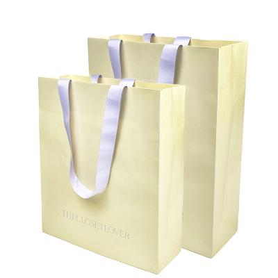 China Recyclable Luxury Ribbon Handles Shoes Apparel Shopping Packaging Custom Printed Logo Euro Paper Promotional Gift Bags for sale