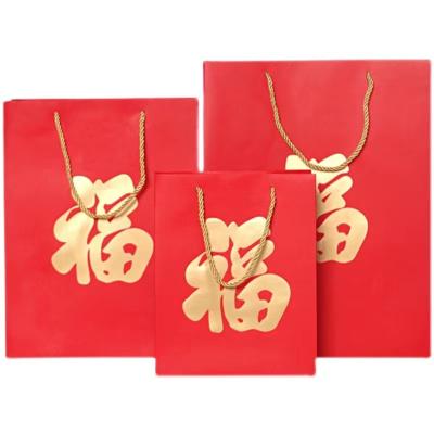 China Recycled Materials New Each Gift Bag Red Hot Stamping Gift Bags Customized Logo is Festival Bag. for sale