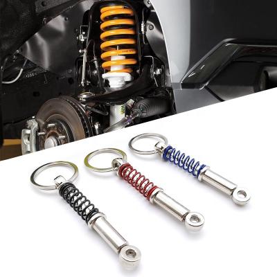 China Wholesale Fashionable Metal Keychain Shock Absorber Car Shock Absorber Car Spring Shock Zinc Alloy Key Chain for sale