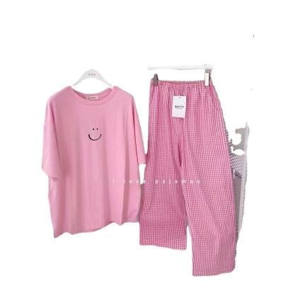 China 2022 QUICK DRY women's summer shorts sleeved pants home pajamas smile face small short pajamas set simple designer pajamas for sale