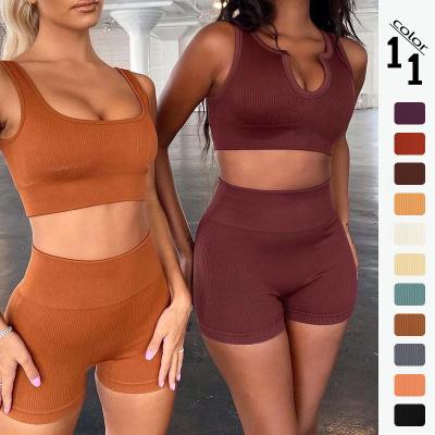 China Fashion Breathable 2pieces Yoga Sets Short Sleeve Sport Sexy Shorts Set Women Sports Gym Wear Leggings Seamless Active Wear Ribbed Yoga Set for sale