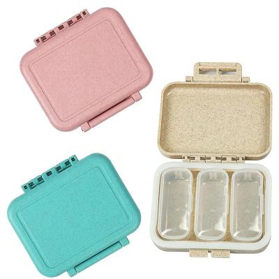 China Plastic Pill Container Straw Pill Organizer Travel Small Wheat Storage Box Daily Pill Box for Purse Pouch for sale