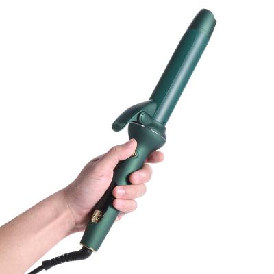 China Automatic Professional Digital Rotation Volumizing Crimper Hair Scalding Curling Wand Portable Anti Curling Iron for sale