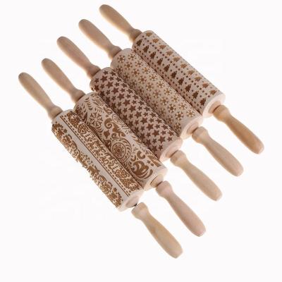 China Brown Traditional Wooden Snowflake 3D Embossing Christmas Printing Rolling Pin Wooden Carving Dumpling Baking And Cake Decoration for sale