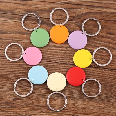 China DIY Faux Fur Ball Pompom Chains Customize 3CM Round Wooden Disc Keyring Colorful White Monogram Engrave Wood Key Chains for sale