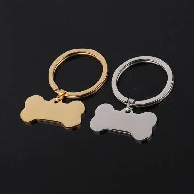 China Faux Fur Ball Pompom Chains Free Sample Stainless Steel Bone Dog Tag Mute Key Chain DIY Sublimation Engraving Pet Key Chain for sale