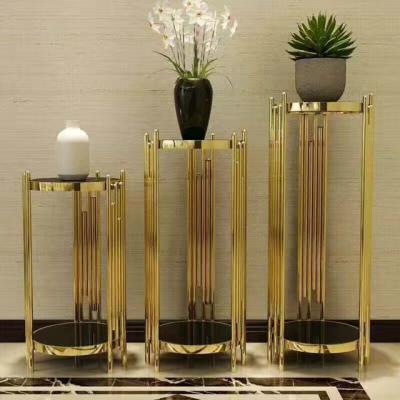 China Modern Round Coffee Table Flower Stand 3 Pieces Stainless Steel Gold Coffee Table With Black Glass Tops for sale