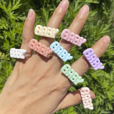 China Cute Clear Color BOHEMIA Acrylic Resin Alphabet Baby Finger Ring Letter Baby Index Finger Rings R0815 for sale