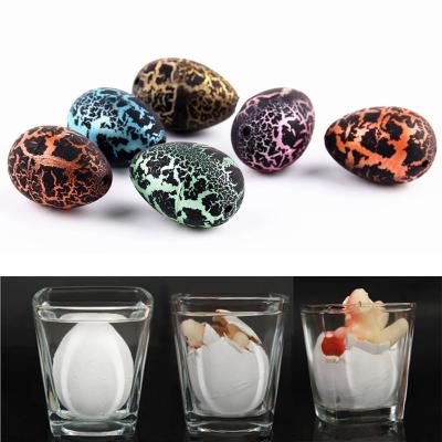 China Wholesale Novelty Toys Small Dinosaur Eggs Children's Toys Cracked Black Rubber Hatching Eggs Inflated Soaked Dinosaur Eggs for sale