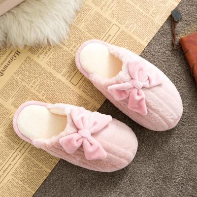 China Anti-odor autumn winter explosion style bow thickened plush warm home slippers non-slip women's couples cotton home shoes for sale